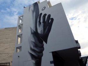 mural titled Grip by Ino